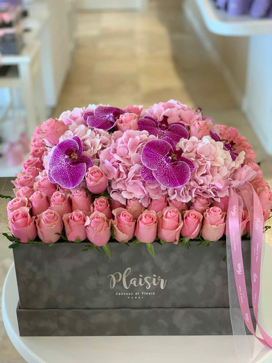 Plaisir's boxed flowers will make your gift memorable.
