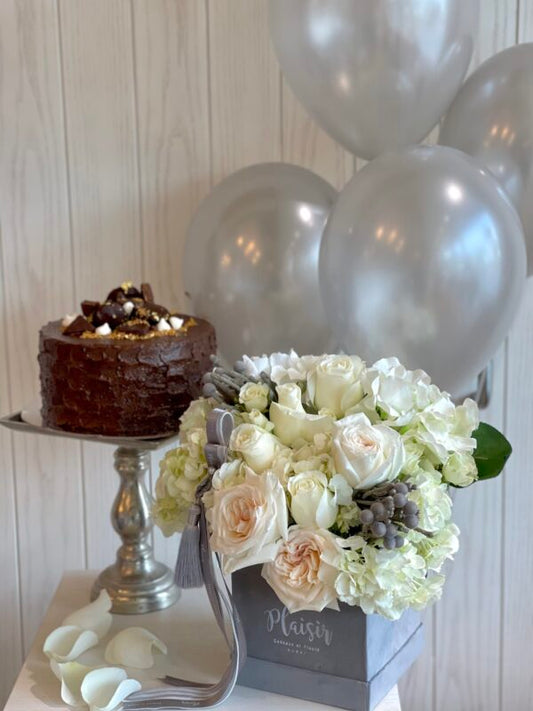 Get a luxurious giftset of cake and flower delivery in Dubai